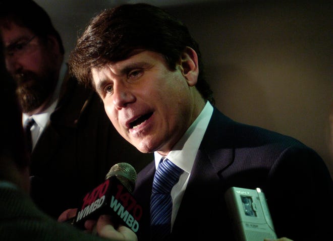 Then-Illinois Gov. Rod Blagojevich speaks with supporters and the press in Peoria in February 2006.