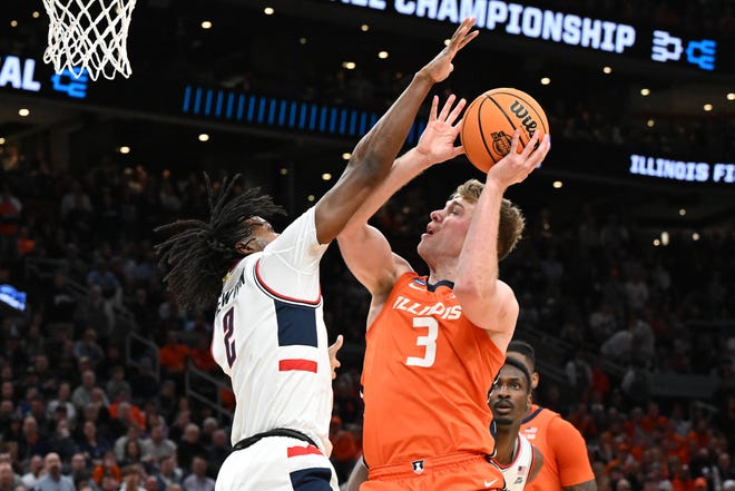 Mar 30, 2024; Boston, MA, USA;Illinois Fighting Illini forward Marcus Domask (3) shoots the ball against Connecticut Huskies guard Tristen Newton (2) in the finals of the East Regional of the 2024 NCAA Tournament at TD Garden. Mandatory Credit: Brian Fluharty-USA TODAY Sports