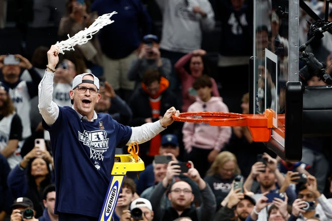 Mar 30, 2024; Boston, MA, USA; Connecticut Huskies head coach Dan Hurley reacts after cutting the net after defeating the Illinois Fighting Illini in the finals of the East Regional of the 2024 NCAA Tournament at TD Garden. Mandatory Credit: Winslow Townson-USA TODAY Sports
