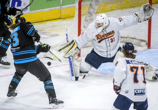 Peoria goaltender Nick Latinovich (31) stretches to block a shot from Quad City's Weiland Parrish in the first period of their SPHL hockey game Saturday, April 6, 2024 at the Peoria Civic Center.
