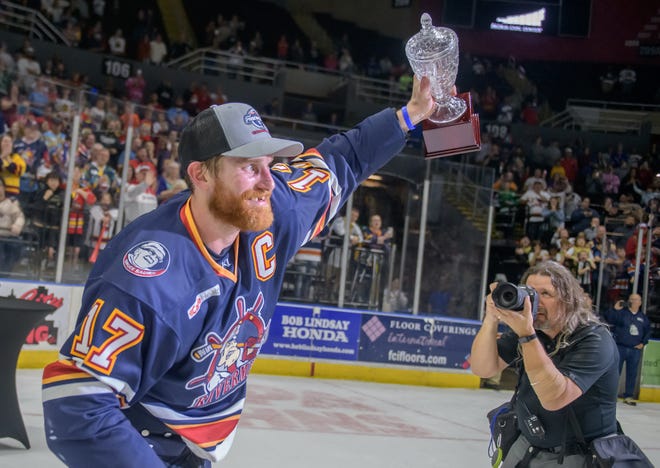 Peoria's Alec Hagaman raises the SPHL President's Cup MVP award after his performance in the playoffs. The Rivermen defeated the Huntsville Havoc 5-1 in the deciding game of the SPHL President's Cup finals Sunday, April 28, 2024 at the Peoria Civic Center.