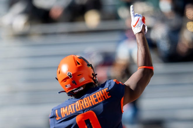 Oct 31, 2020; Champaign, Illinois, USA; Illinois Fighting Illini wide receiver Josh Imatorbhebhe (9) celebrates running back Mike Epstein’s touchdown during the first half against the Purdue Boilermakers at Memorial Stadium. Mandatory Credit: Patrick Gorski-USA TODAY Sports