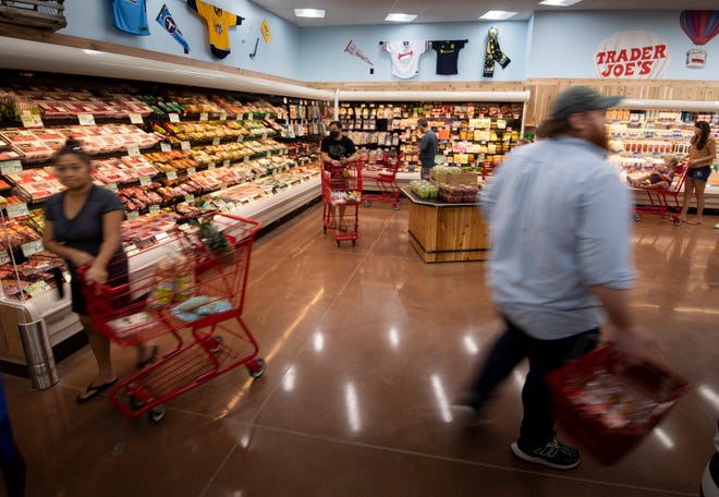 Customers shop at the new Trader Joe's store Friday, Aug. 27, 2021, in Franklin, Tenn.