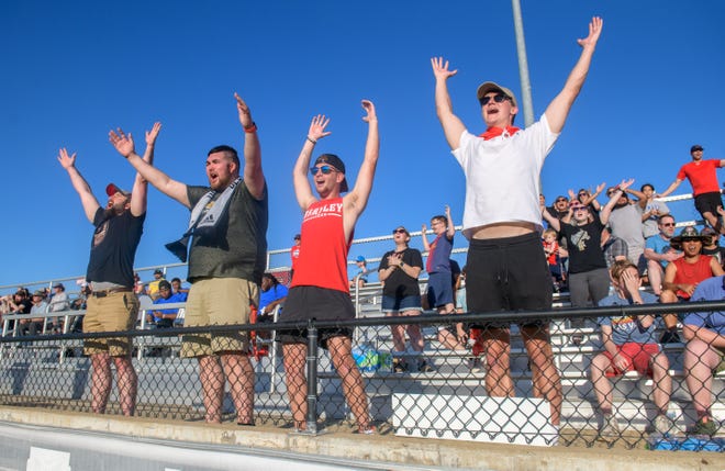 From left to right, Andrew Barra, Drew Clark, Blake Gibson, and Justin Hart and the rest of The 309 soccer fan club call out players' names as they are introduced before start of a USL 2 match between Peoria City and Des Moines on Wednesday, June 22, 2022 at Shea Stadium.